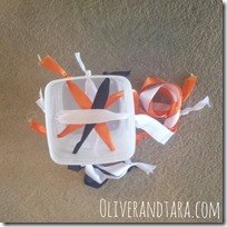 Pull String Toy: A DIY activity for infants and toddlers! Great for cause and effect as well as fine motor! | find it at http://www.Oliverandtara.com 